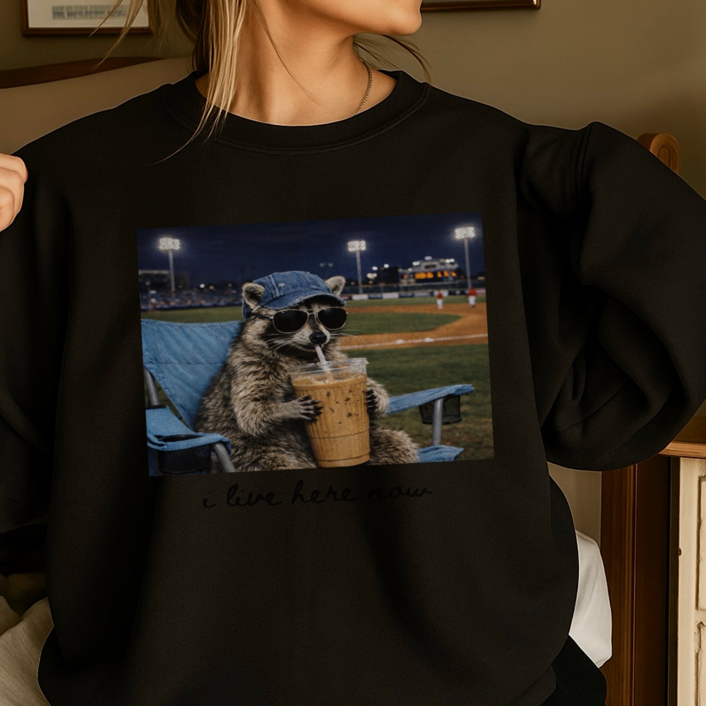 I Live Here Now Raccoon Baseball Crewneck Sweatshirt