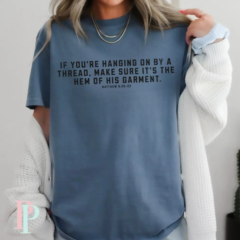 If You’re Hanging On By A Thread make Sure It’s The Hem Of His Garment Comfort Color Graphic Tee SMALL / BLUE JEAN