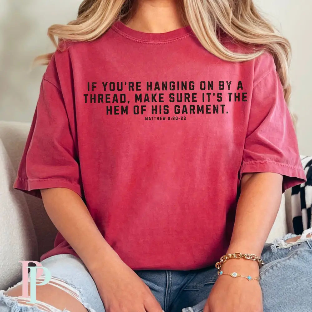 If You’re Hanging On By A Thread make Sure It’s The Hem Of His Garment Comfort Color Graphic Tee SMALL / CRIMSON