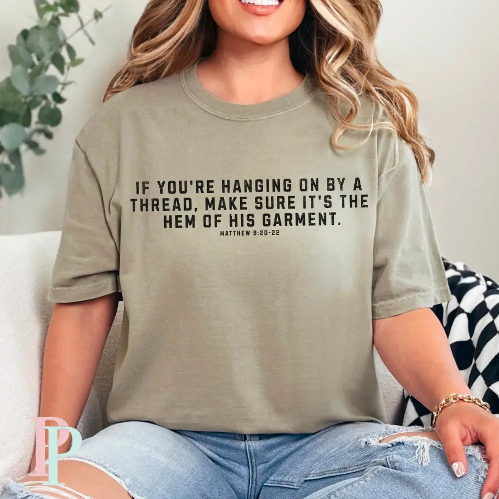 If You’re Hanging On By A Thread make Sure It’s The Hem Of His Garment Comfort Color Graphic Tee SMALL / KHAKI
