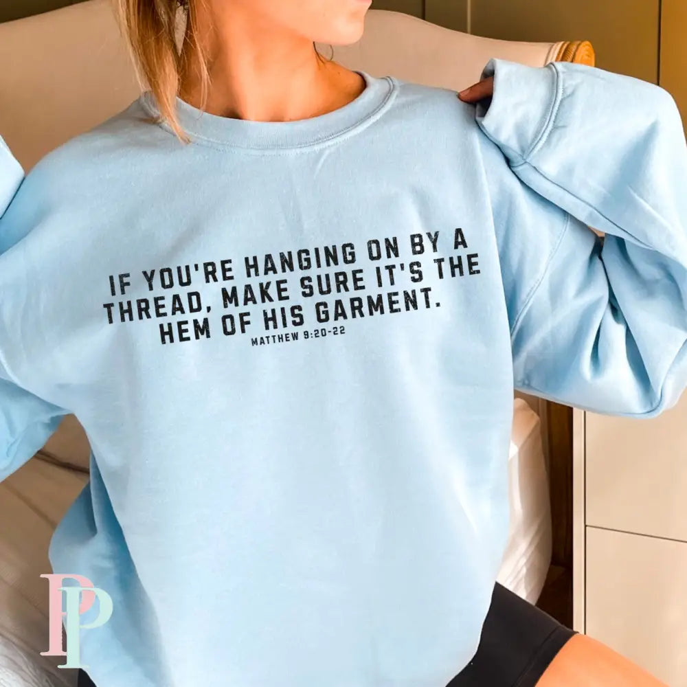 If You’re Hanging On By A Thread Make Sure It’s The Hem Of His Garment Crewneck Sweatshirt Light Blue / Small