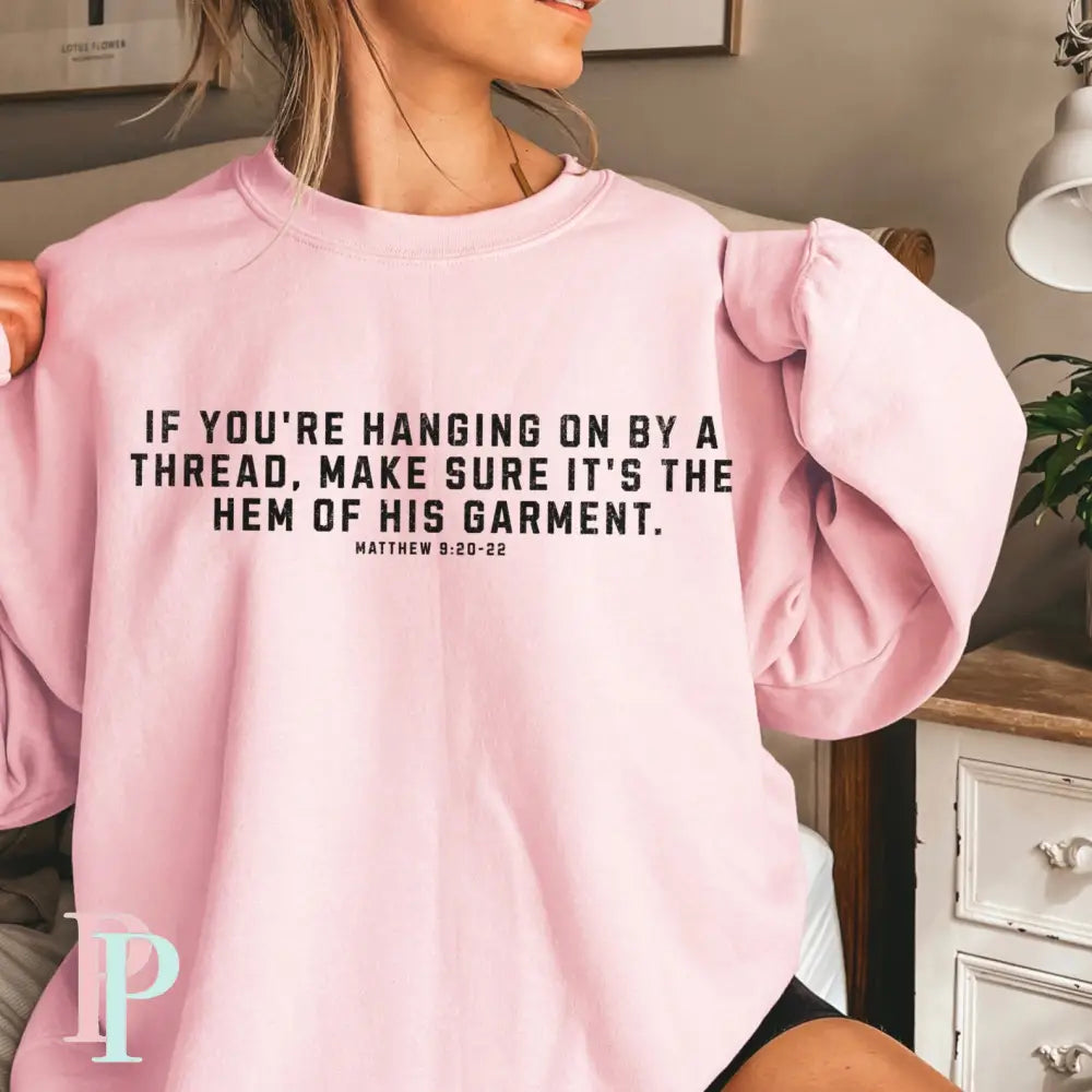 If You’re Hanging On By A Thread Make Sure It’s The Hem Of His Garment Crewneck Sweatshirt Pink / Small