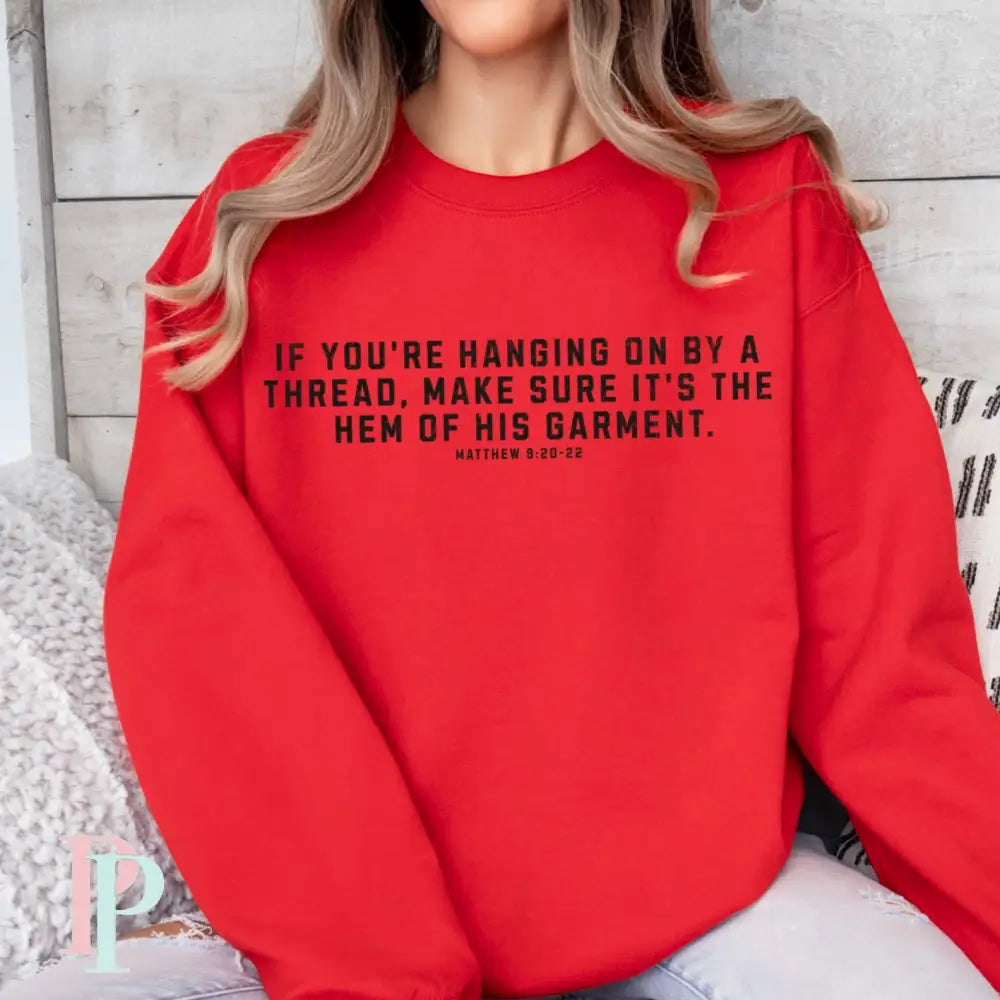 If You’re Hanging On By A Thread Make Sure It’s The Hem Of His Garment Crewneck Sweatshirt Red / Small