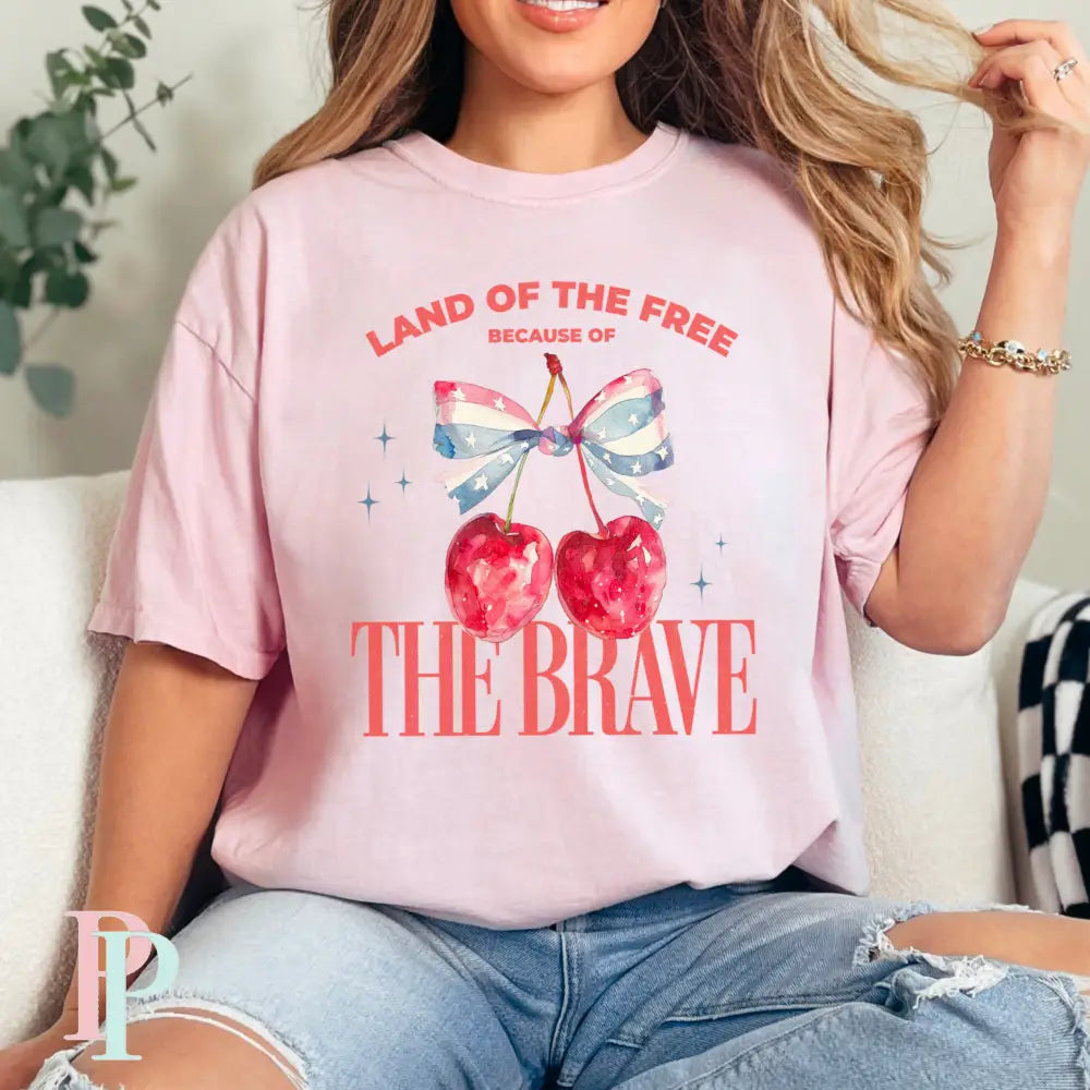 Land Of The Free Because Of The Brave Comfort Color Graphic Tee SMALL / BLOSSOM