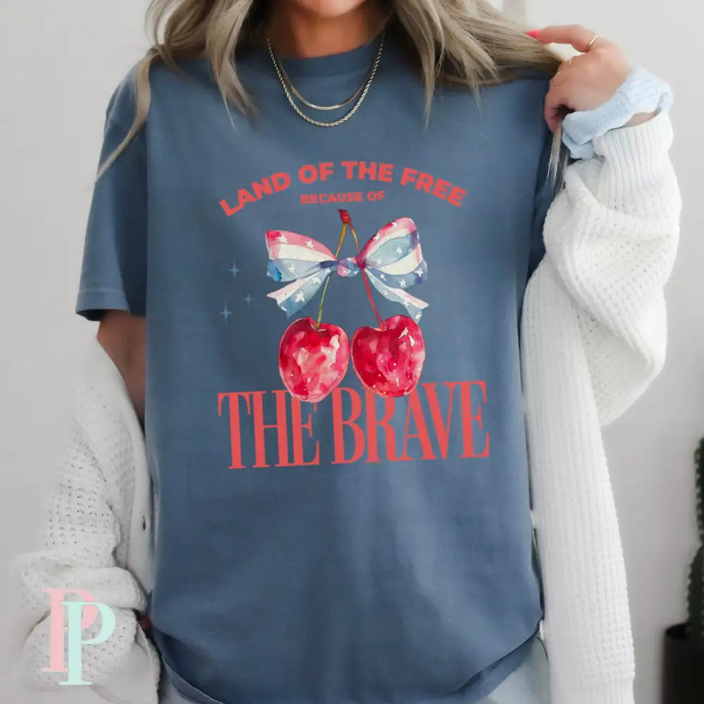 Land Of The Free Because Of The Brave Comfort Color Graphic Tee SMALL / BLUE JEAN