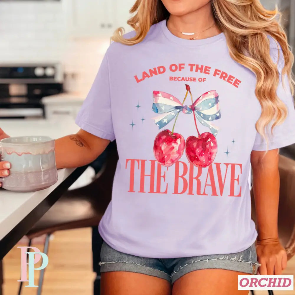 Land Of The Free Because Of The Brave Comfort Color Graphic Tee SMALL / ORCHID