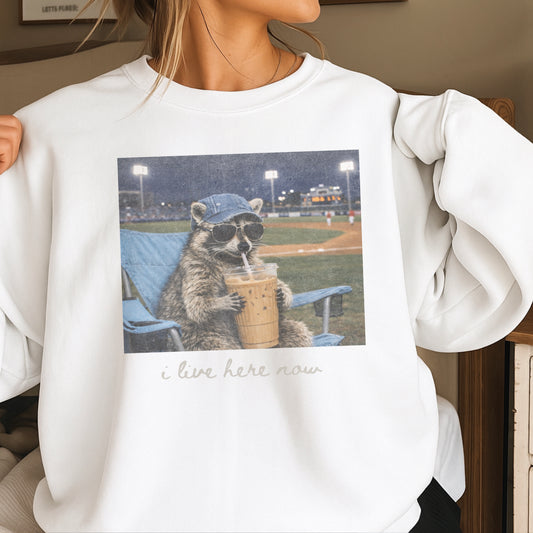 I Live Here Now Raccoon Baseball Crewneck Sweatshirt