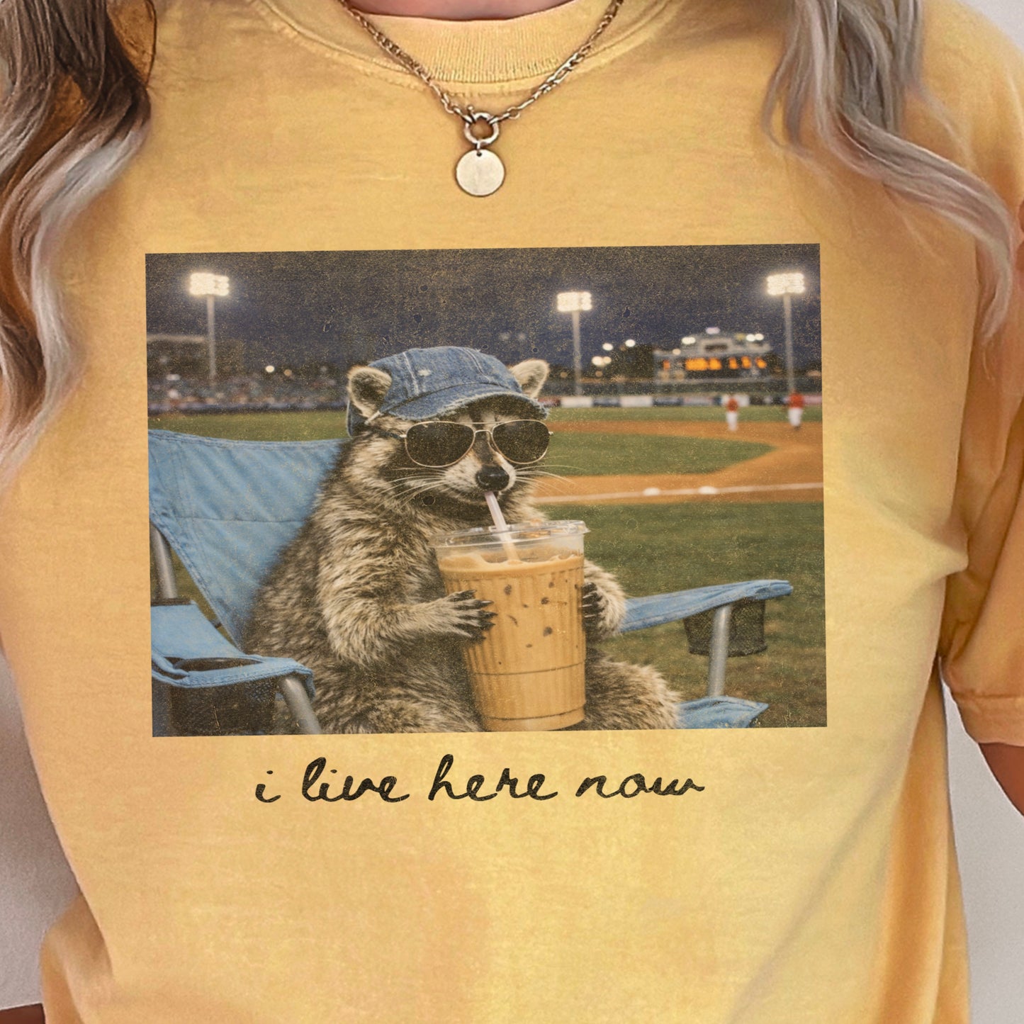 I Live Here Now Raccoon Baseball Comfort Color Graphic Tee