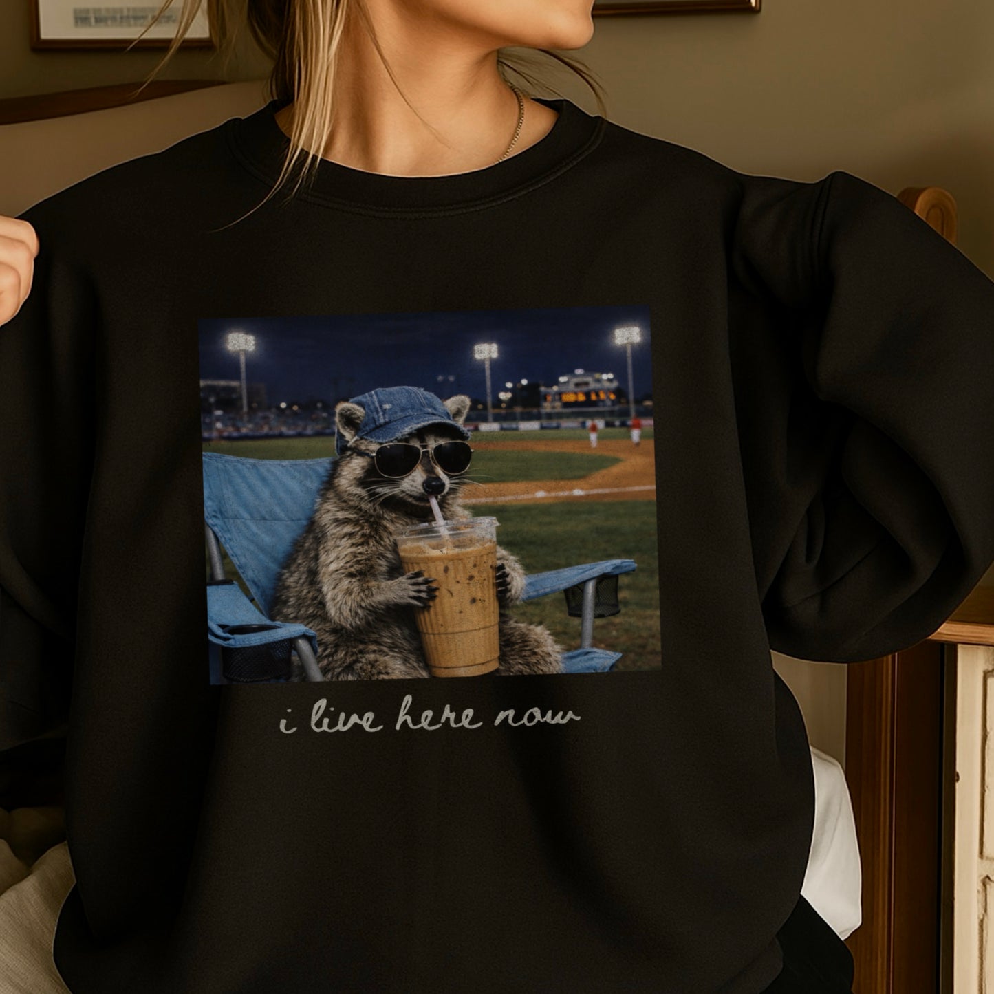 I Live Here Now Raccoon Baseball Crewneck Sweatshirt