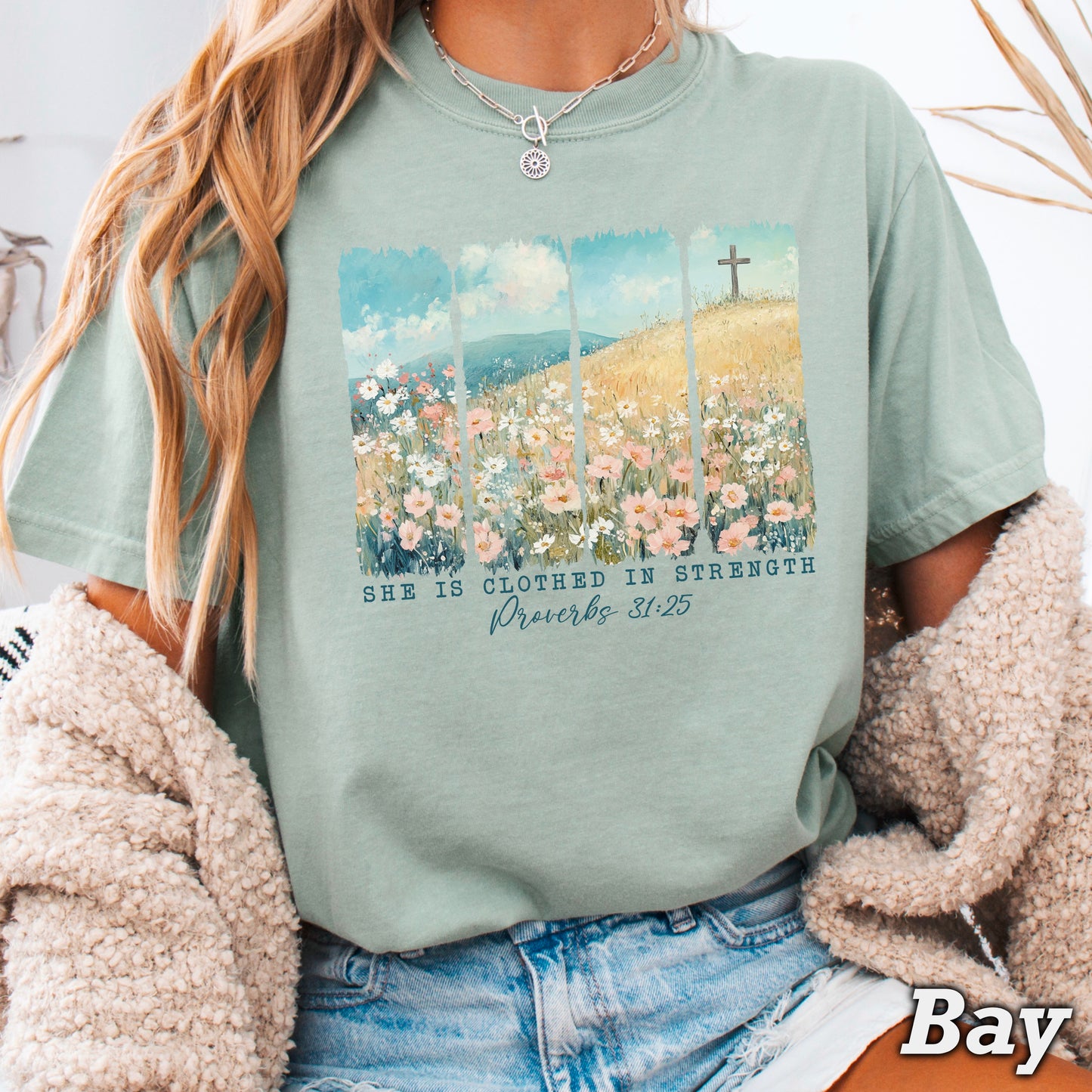 She Is Clothed In Strength Christian Comfort Color Graphic Tee