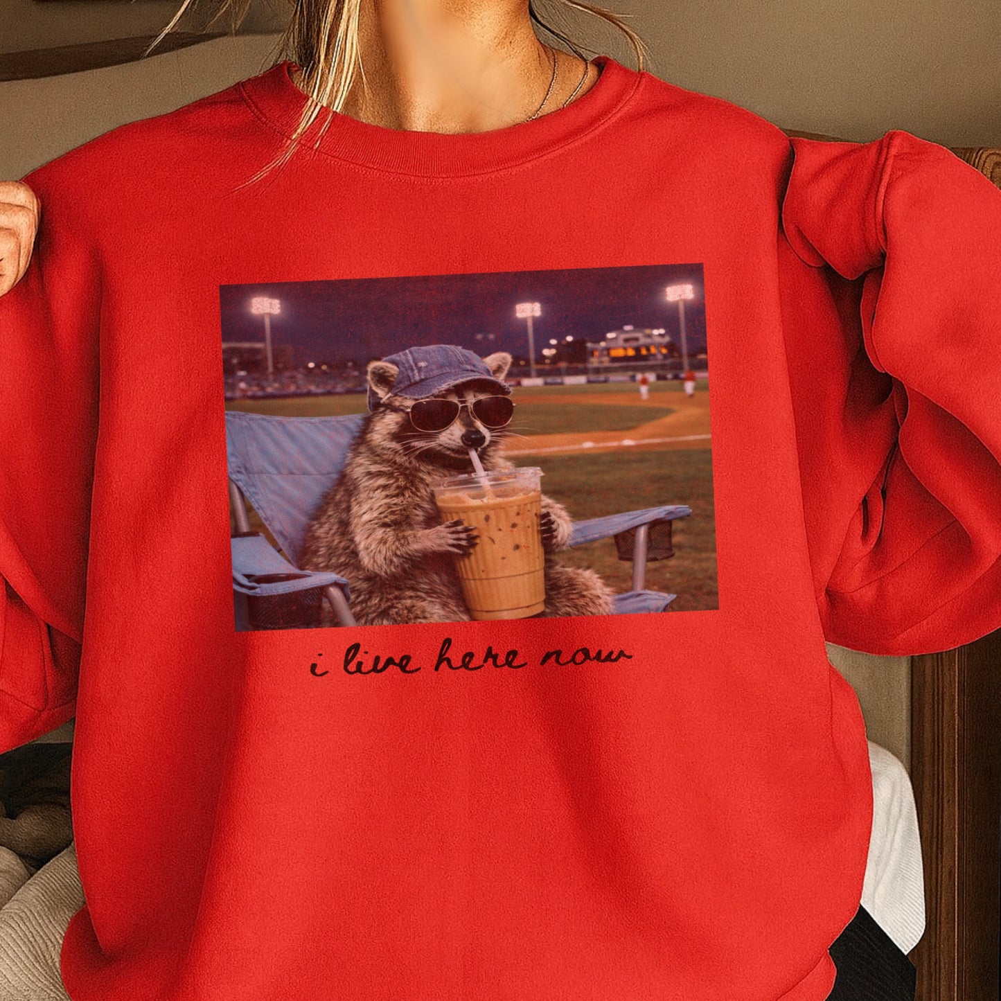 I Live Here Now Raccoon Baseball Crewneck Sweatshirt
