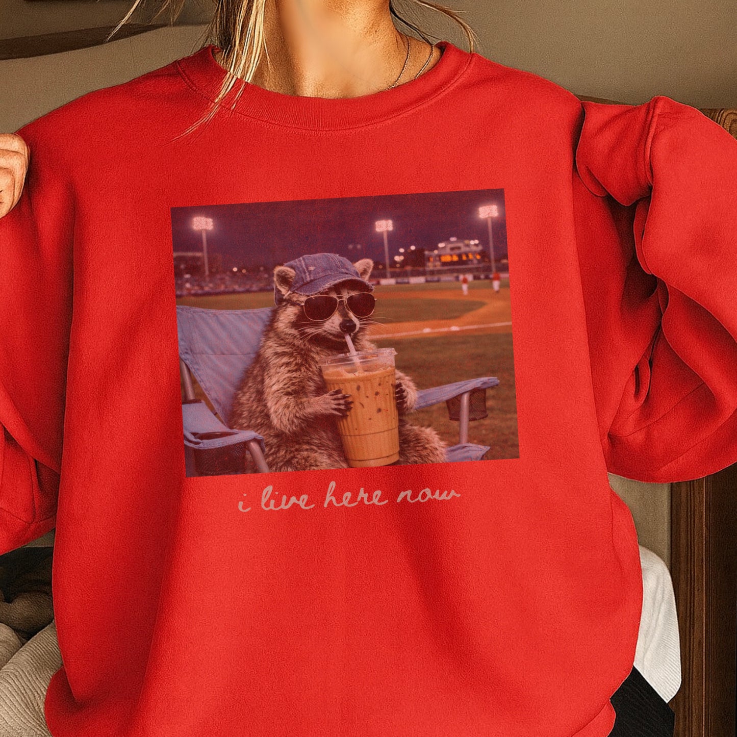 I Live Here Now Raccoon Baseball Crewneck Sweatshirt