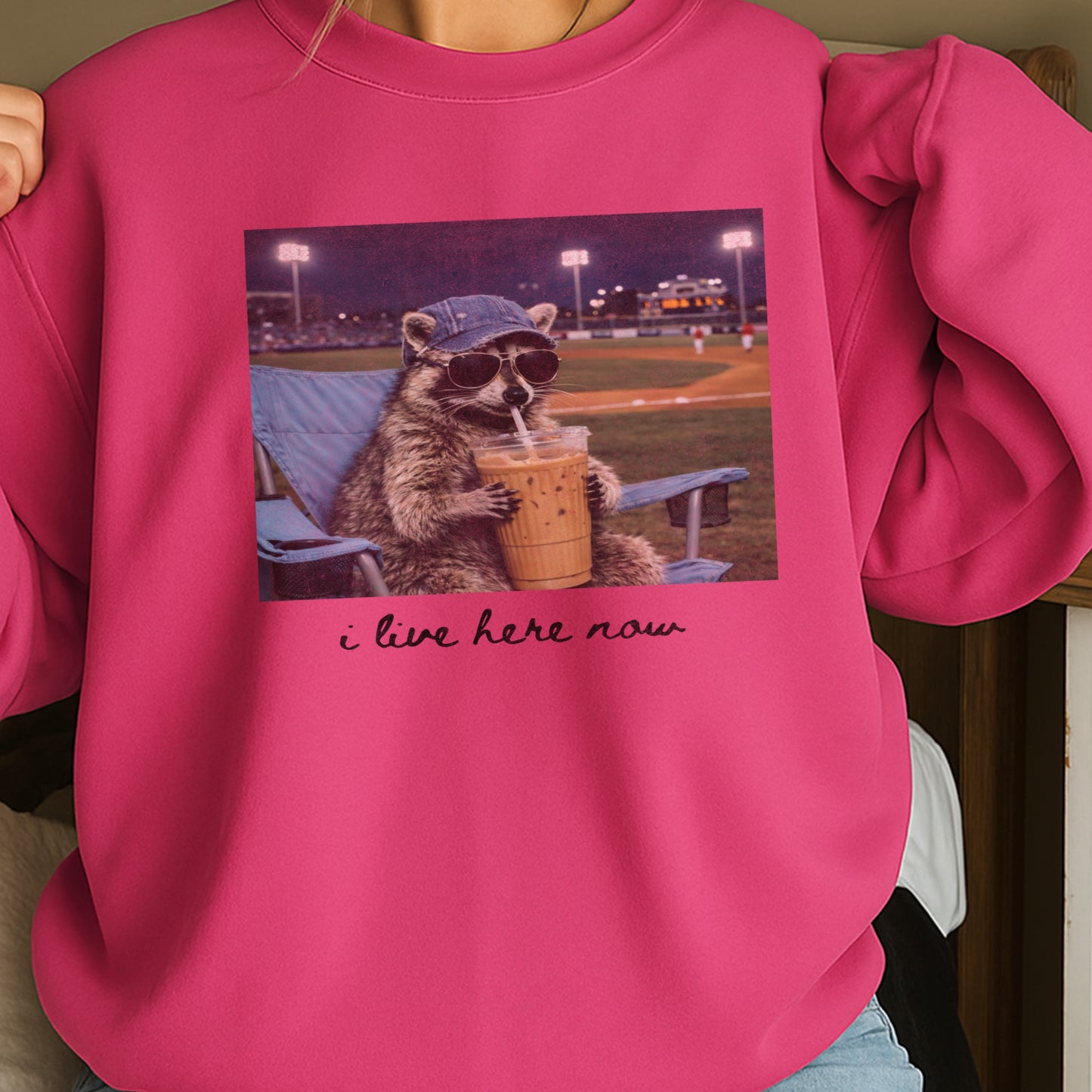 I Live Here Now Raccoon Baseball Crewneck Sweatshirt
