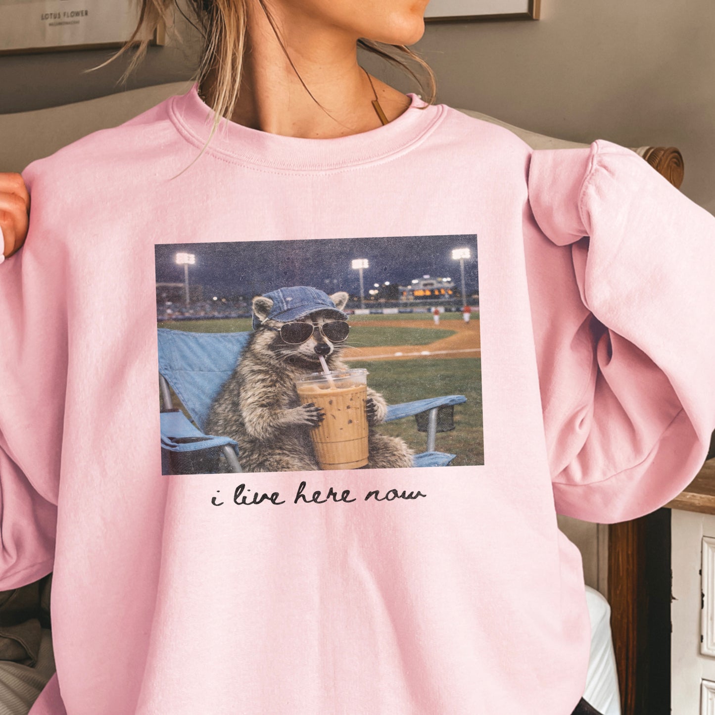 I Live Here Now Raccoon Baseball Crewneck Sweatshirt