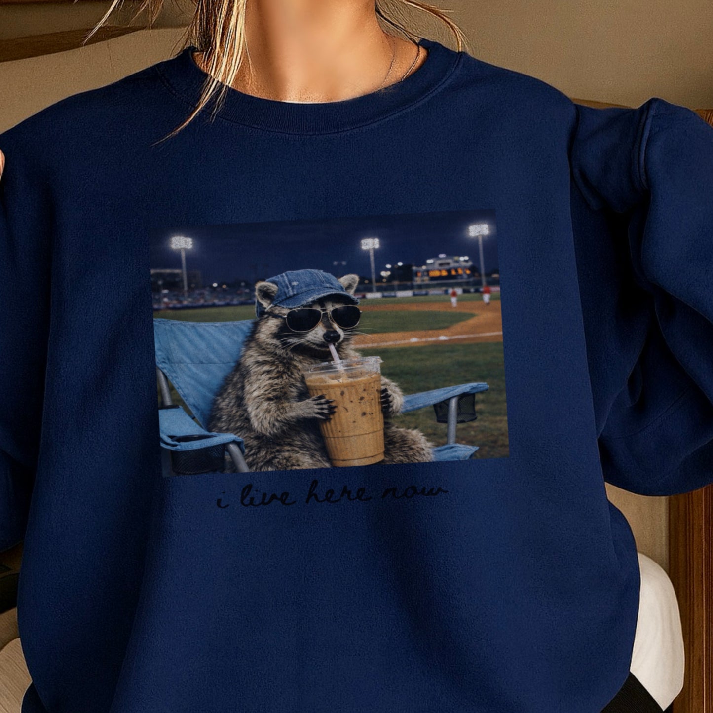 I Live Here Now Raccoon Baseball Crewneck Sweatshirt
