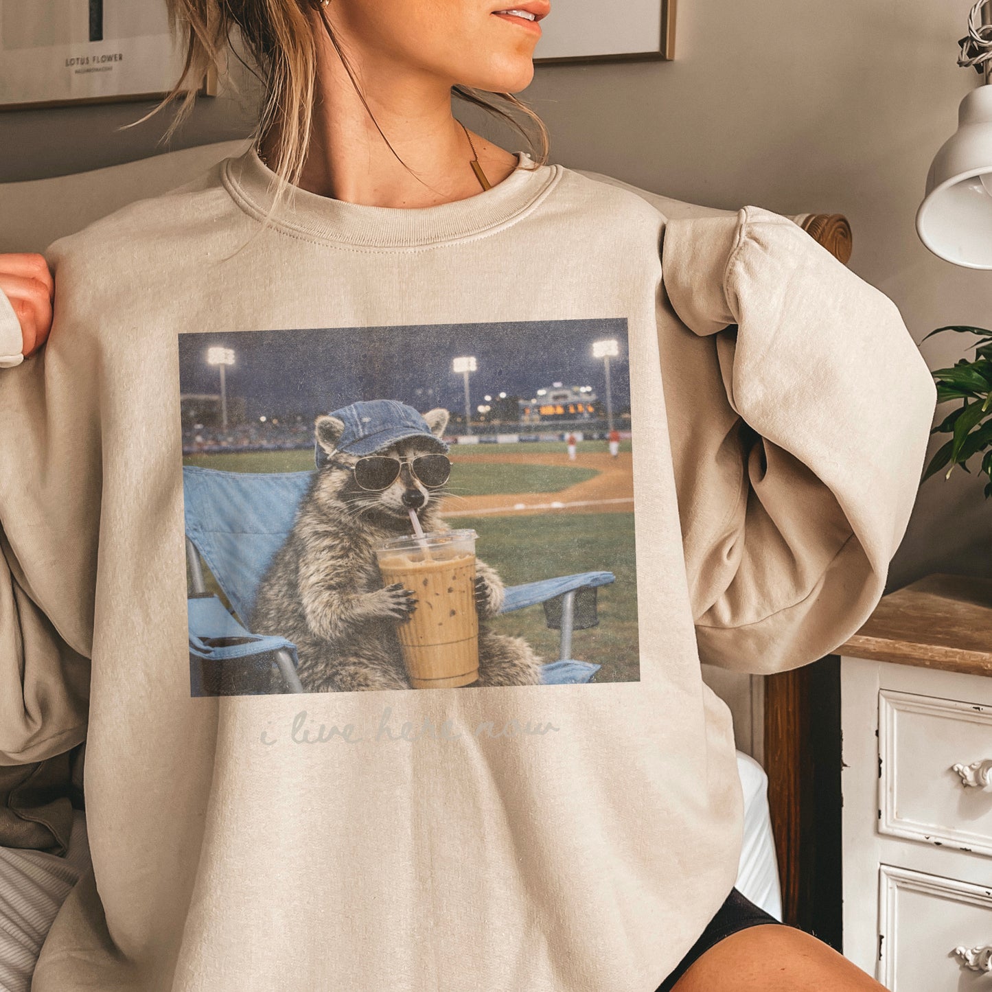 I Live Here Now Raccoon Baseball Crewneck Sweatshirt