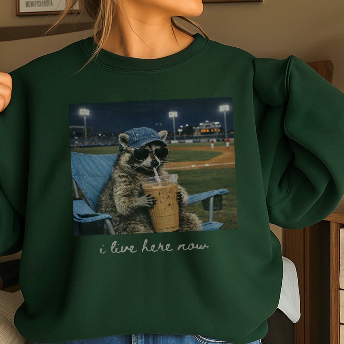 I Live Here Now Raccoon Baseball Crewneck Sweatshirt