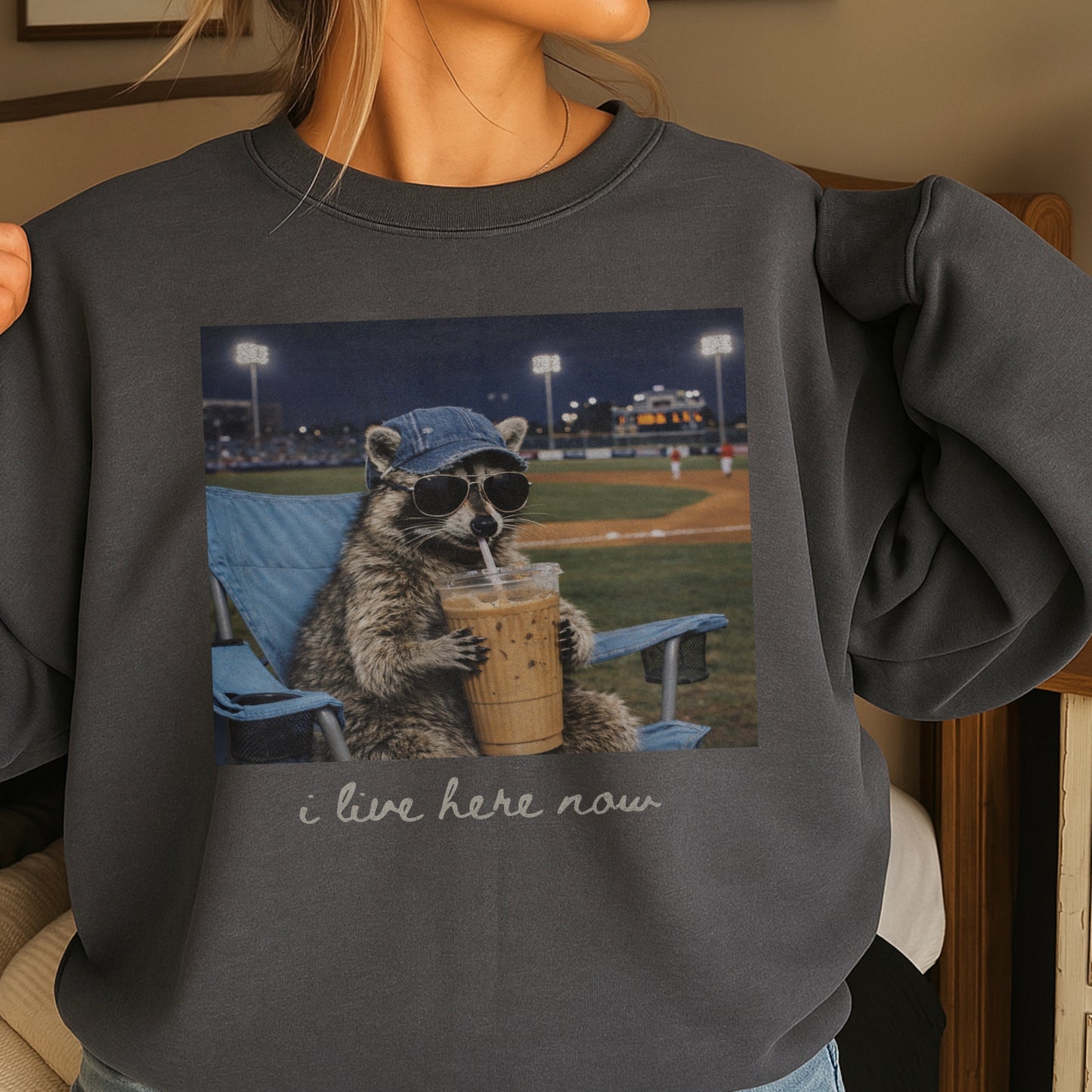I Live Here Now Raccoon Baseball Crewneck Sweatshirt