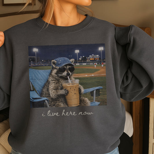 I Live Here Now Raccoon Baseball Crewneck Sweatshirt