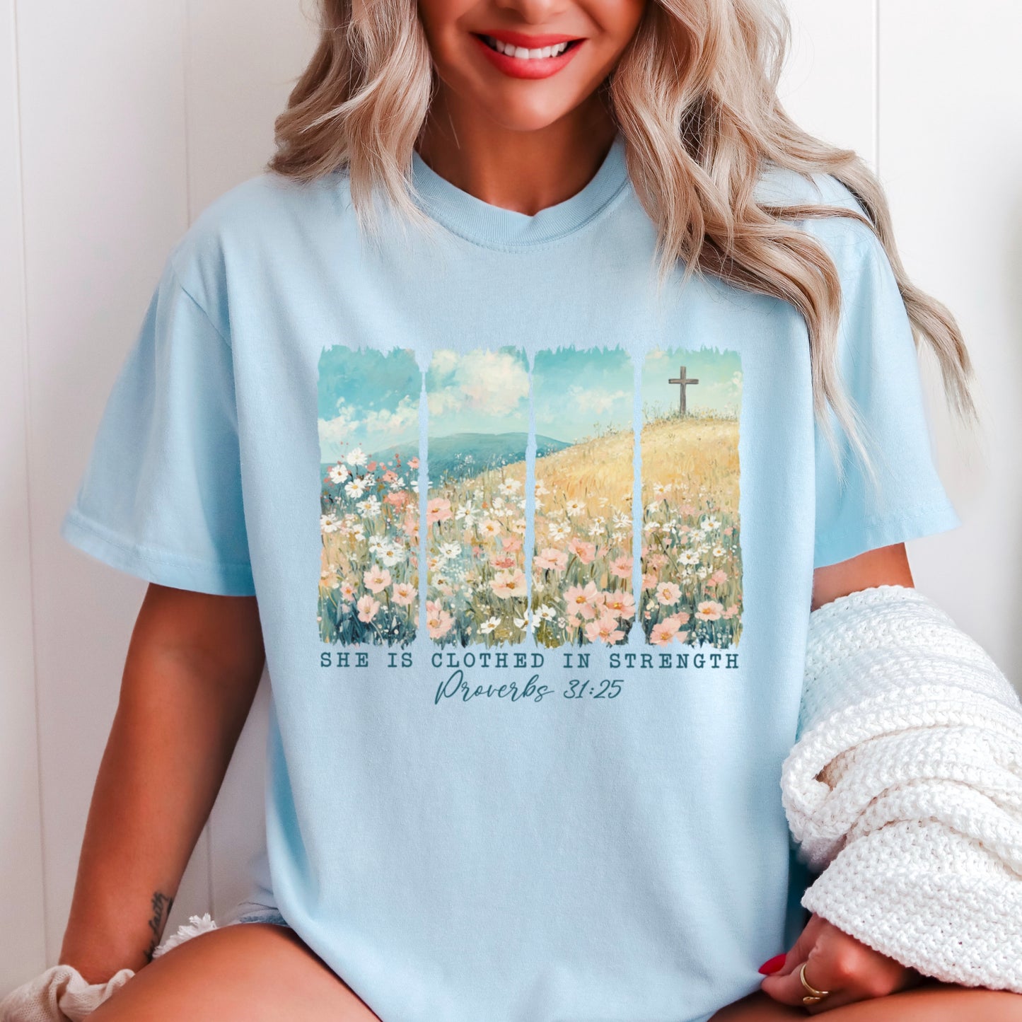 She Is Clothed In Strength Christian Comfort Color Graphic Tee
