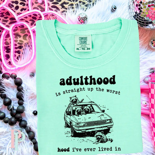 Adulthood Is The Worst Hood Comfort Color Graphic Tee
