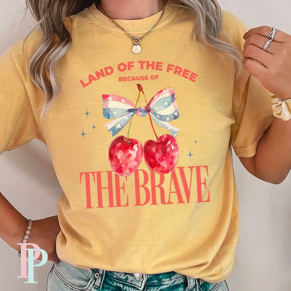 Land Of The Free Because Of The Brave Comfort Color Graphic Tee SMALL / MUSTARD