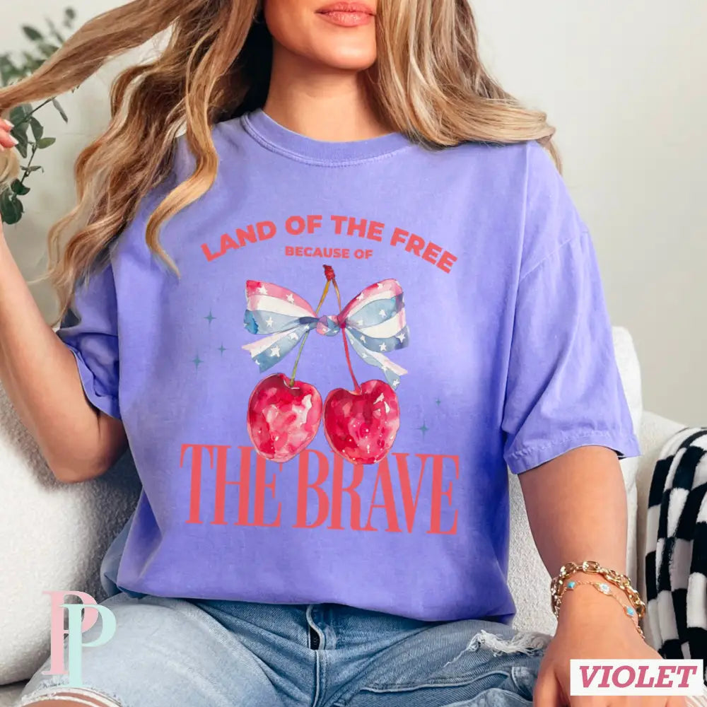 Land Of The Free Because Of The Brave Comfort Color Graphic Tee SMALL / VIOLET